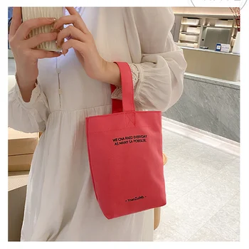 2023 Нов минималистичен стил мини преносим платно чанта обяд чанта бонбони цвят кана китката каишка обикновен универсален мода платно чанта